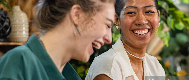 Friends laughing at a party